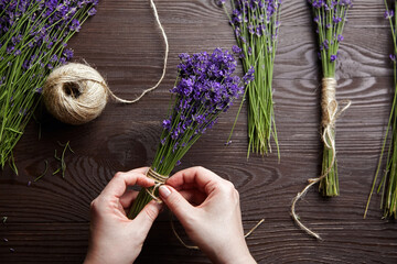 Floristic, flower arranging - making fresh natural lavender bouquets, flat lay