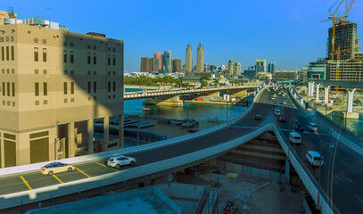 A view looking back over the causeway to the Palm Jumeirah complex in Dubai, UAE in springtime