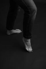 Details of body of beautiful girl, fashion and art, authentic black and white photo shoot