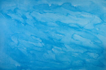 Abstract blue watercolor background on white. Watercolor texture. Seamless background pattern horizontal painted in watercolor