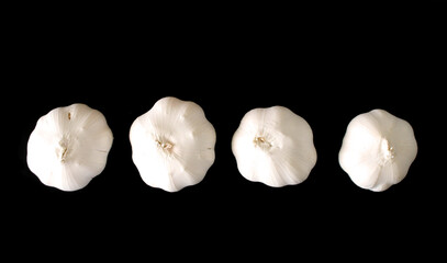 garlic on black background