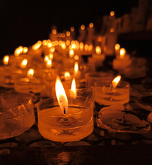 Candles lit ritual of devotion and prayer to God