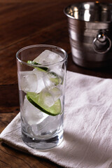 glas with ice and lemon