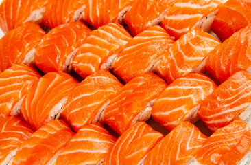 Sushi roll set top view. Philadelphia roll sushi with salmon, shrimps, avocado, cream cheese. Sushi menu. Japanese food