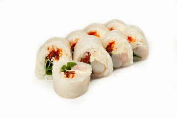 Sushi roll in rice paper with shrimp on a white plate, classic Japanese sushi. Traditional Japanese food with maki Delicious pieces of sushi For the restaurant menu. copyspace.