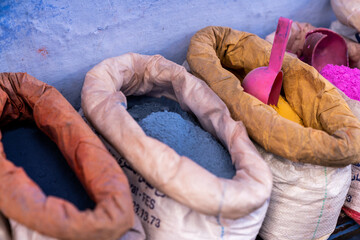 Row of colorful powered paint pigments
