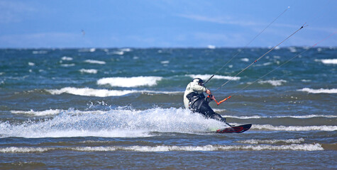 kitesurfer riding at Troon, Scotland	