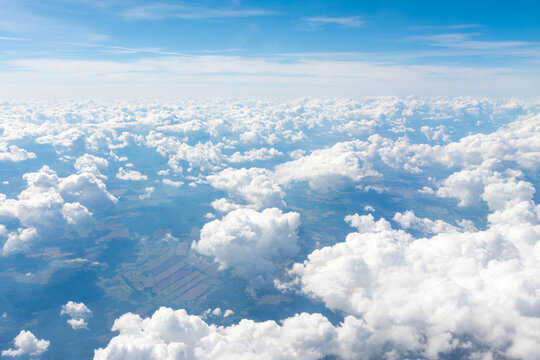 view of the clouds from the plane window