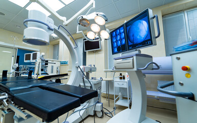 Interior hospital design concept. Interior of operating room in modern clinic. Screen with tests closeup