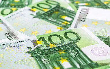 Financial background of one hundred euro banknotes.