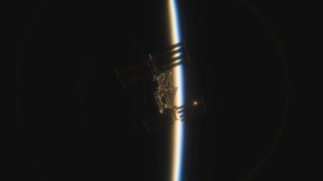Animation of the International Space Station ISS Floating in Orbit above Planet Earth in outer space