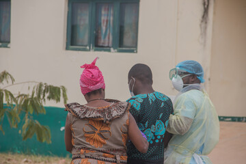 Covid-19 positive patient, taken to covid hospital isolation by medical staff and care taker (family member)