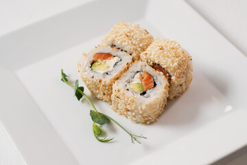 Top view of assorted sushi rolls.