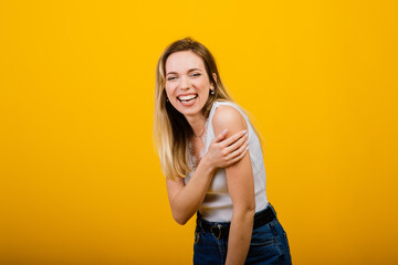 Positive human emotions. Headshot of happy emotional woman laughing from the bottom of her heart, showing perfect white teeth while having fun