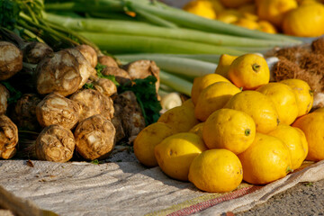 Yellow lemons and celery sold at the market