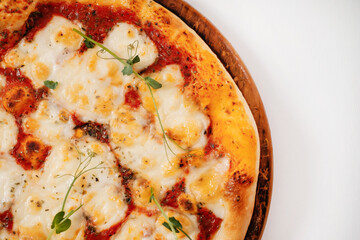 Slice of italian pizza on a white background. Top view close-up.