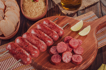 Grilled Sausage skewer on wooden board - Brazilian barbecue