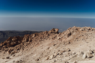 Teide National Park. Beautiful view of volcano. Desert area of a volcanic crater with rocks and mountains. Mount in Tenerife. Canary Islands