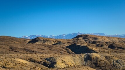 Fototapeta na wymiar Andean desert landscape beneath a deep blue sky near Uspallata, Mendoza, Argentina.