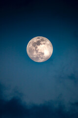 Obraz na płótnie Canvas Full moon in the blue sky