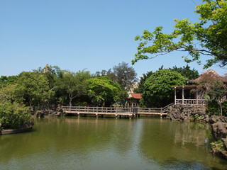 Fototapeta na wymiar Sunny view of a Chinese Garden in Shuangxi Park
