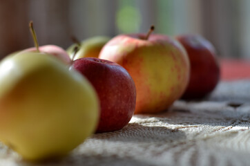 apples on a wooden table