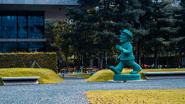 Berlin, Germany - 20 September 2019: Cute giant Ampelmann statue in Berlin, Germany