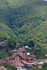 Fototapeta na wymiar View over Sheki Shaki city and the Greater Caucasus mountains in Azerbaijan. Nature of Azerbaijan