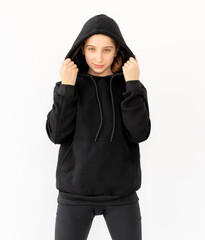 Cute girl in black hood isolated on white background