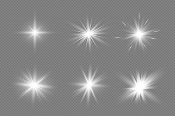 White glowing light explodes on a transparent background. Sparkling magical dust particles. Bright Star. Transparent shining sun, bright flash. Vector sparkles. To center a bright flash