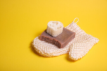 Zero waste bathroom accessories on yellow background