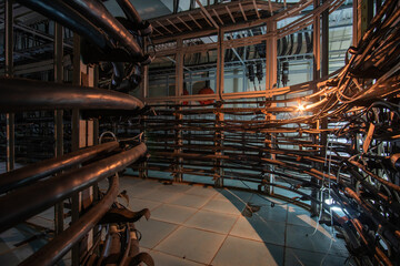 Lots of cables on the cable trays in the cable hub.