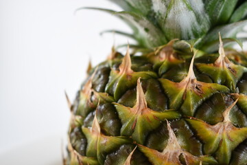 
beautiful view of a yellow pineapple with white background