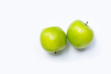 Green apples on white background. Copy space