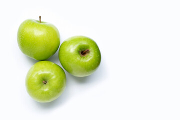 Green apples on white background. Copy space