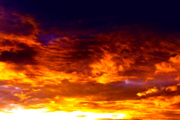 Night sky with fluffy clouds.