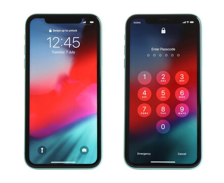 MYKOLAIV, UKRAINE - JULY 07, 2020: New modern iPhone 11 with lock screen and numpad for entering the passcode on white background