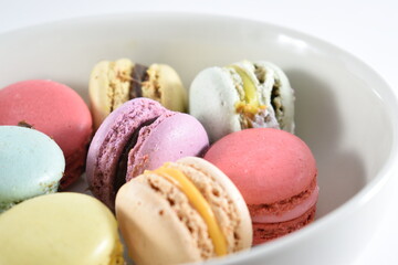 
spectacular views of some different colored sweets on a white background