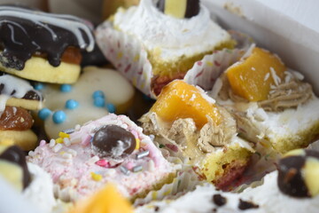 
spectacular views of some different colored sweets on a white background