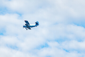 Flight of the retro plane in the sky.