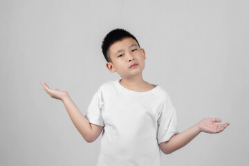 Asian boys studio portrait on gray background