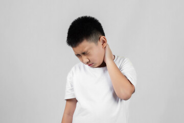 Asian boys studio portrait on gray background