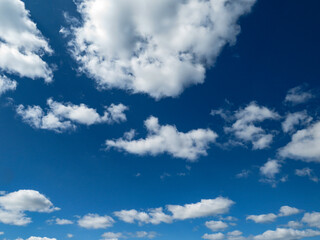Naklejka na ściany i meble Blue sky with clouds and sun summer.