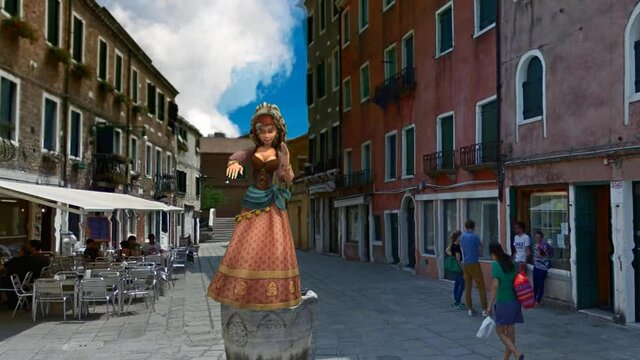 昔の衣装を着てベネチアでサンバを踊る女性
A woman dances the samba in Venice in an old costume
