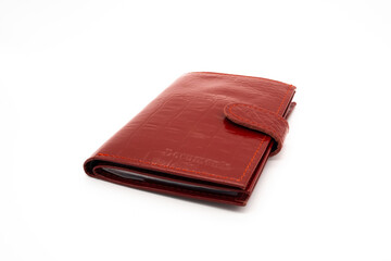 Isolated image of red crocodile skin cover for documents on white background