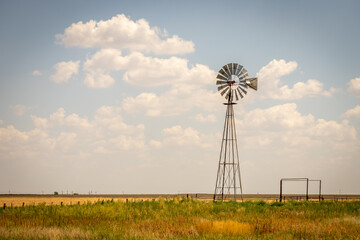 An old windmill in the dry plains of Texas, USA.