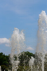 Drops of water in fountain in sunny day.