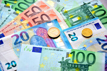 euro banknotes and coins