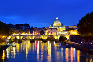 Fototapeta premium Saint Peter Cathedral and bridge at night in Rome, Italy