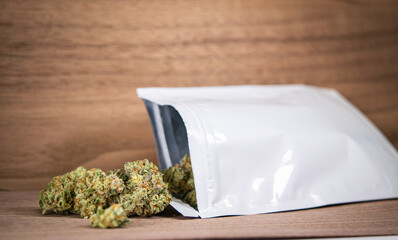 Cannabis spilling out of dispensary bag - obrazy, fototapety, plakaty